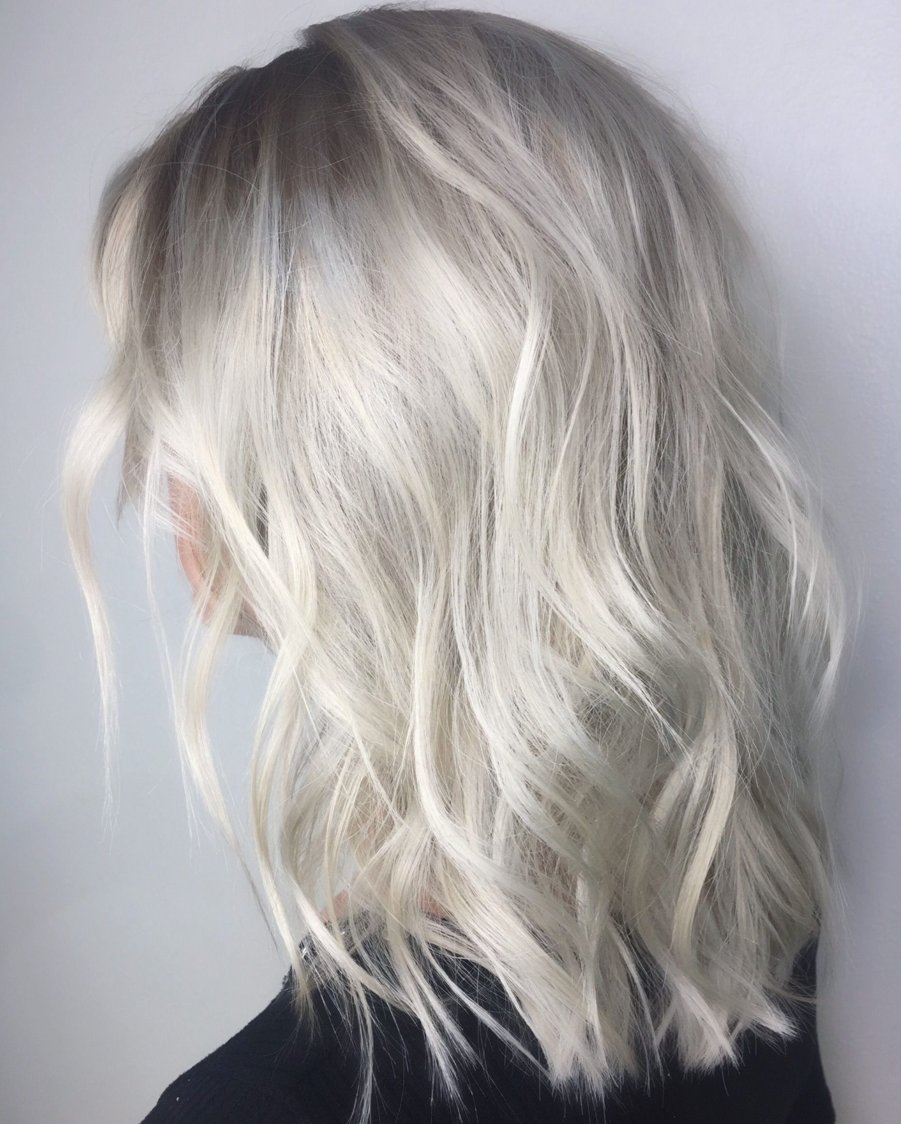 Short mid length platinum blonde hair