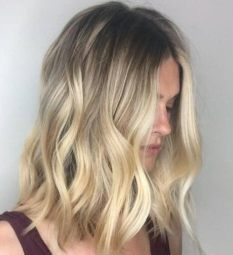 Sun kissed champagne blonde highlights